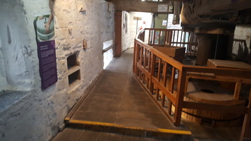 Route back to the front of the Mill, showing another step up and a narrow ramp not suitable for most wheelchairs.