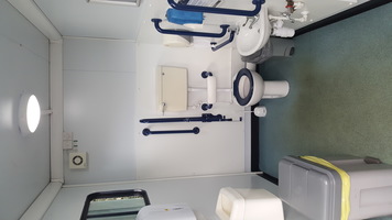 Accessible toilet showing toilet and sink